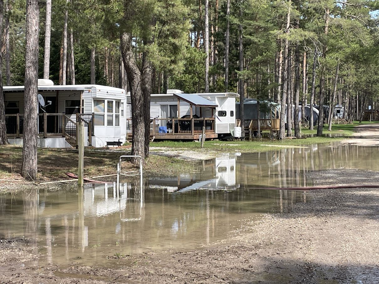 Whispering Pines campground still flooded, opening delayed again | Owen ...