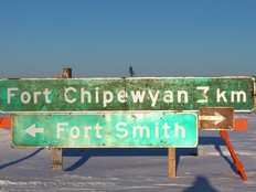 A sign outside Fort Chipewyan, AB. directing motorists to the northern Alberta hamlet and to Fort Smith, NWT.
