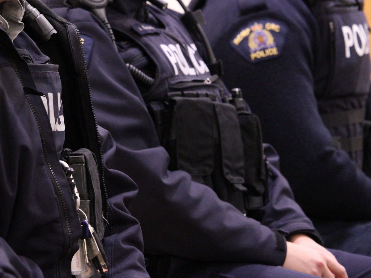 Members of the Wood Buffalo RCMP seated during a community meeting at the Conklin Multiplex on Thursday, January 30, 2020.