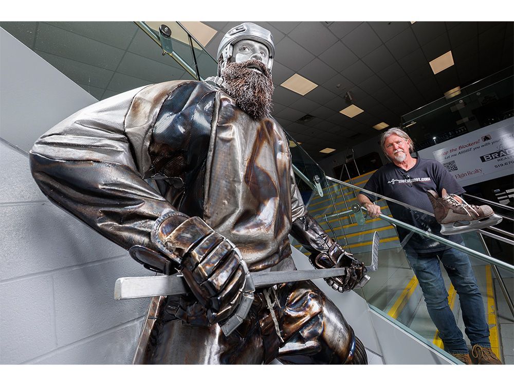 Al Jewell stands beside his metal sculpture of Joe Thornton at the Joe Thornton Community Centre in St. Thomas on Thursday, June 25, 2026. (Geoff Robins/The London Free Press)