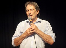 Dr. William Crawford tells a packed cafeteria at Central Algoma Secondary School Wednesday evening that several hurdles must be cleared to even get a new hospital concept to the approval stage.