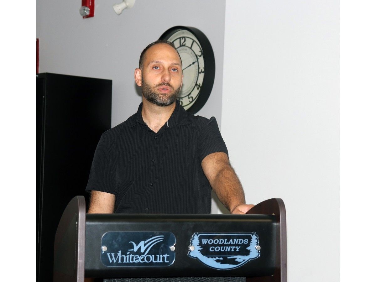 Sam Ammar at podium