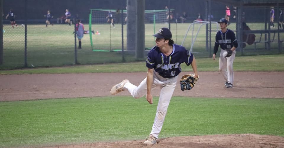 Baseball pitcher throwing
