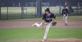 Baseball pitcher throwing