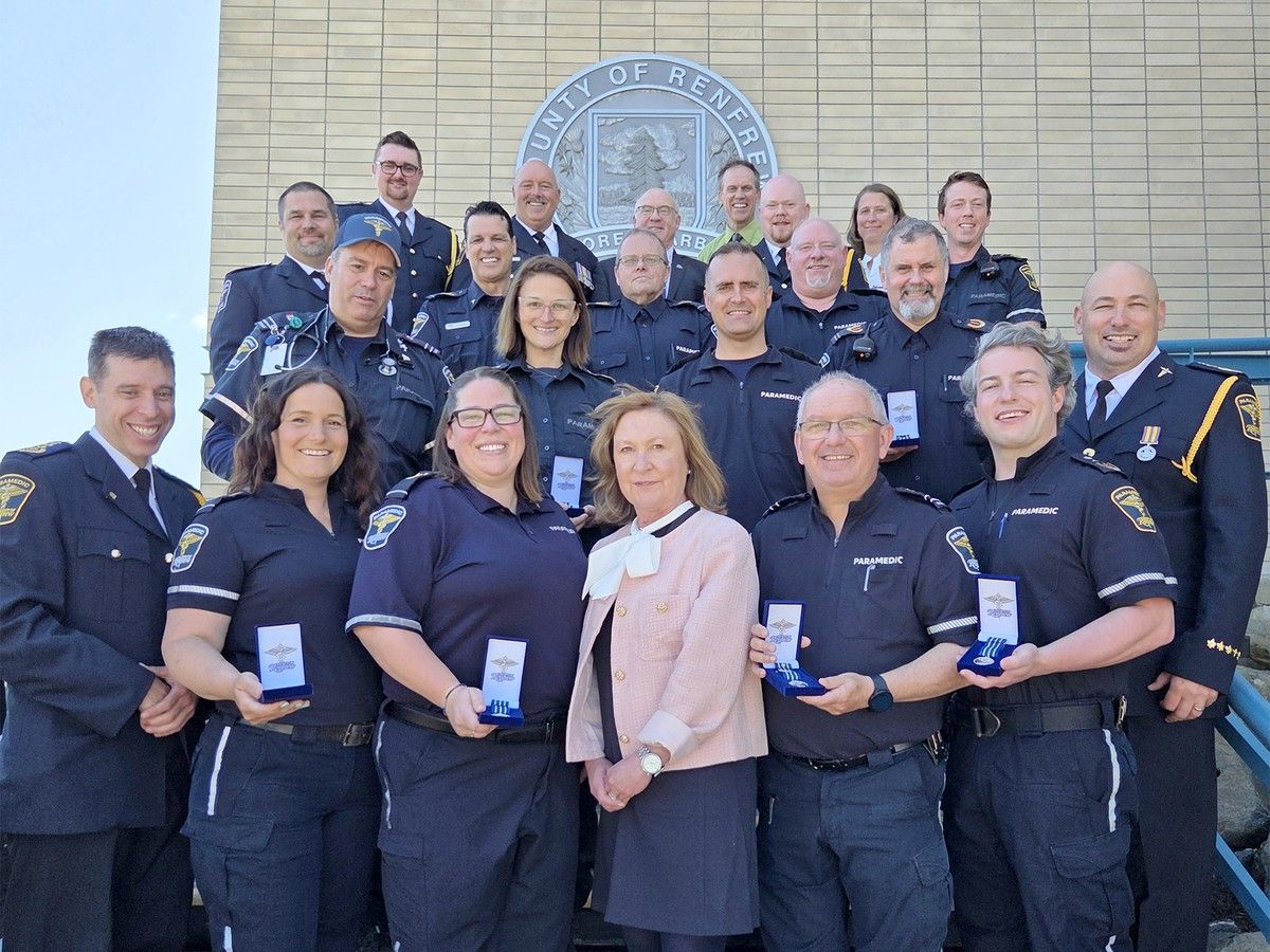 Paramedic group photo on steps of admin building