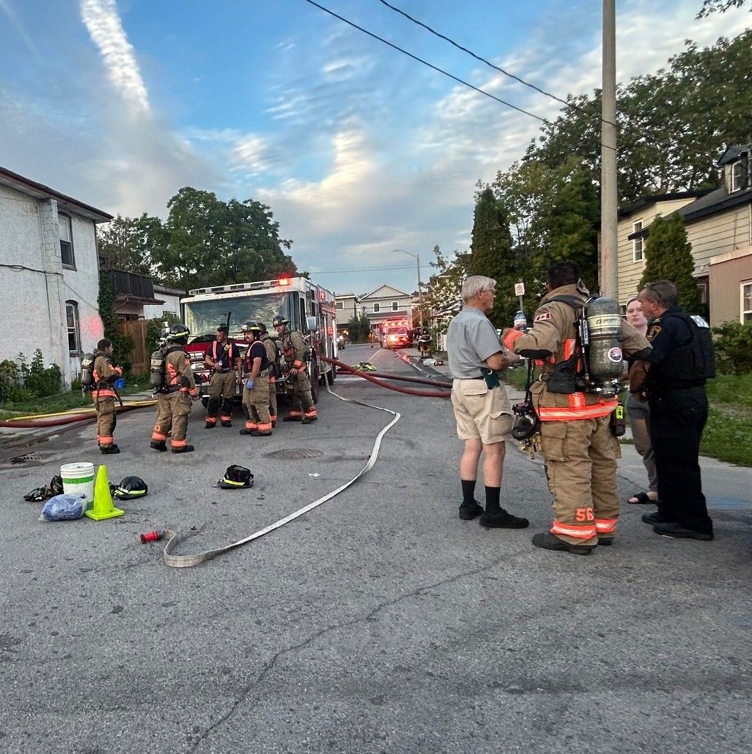 Belleville firefighters are shown on scene of a residential fire.