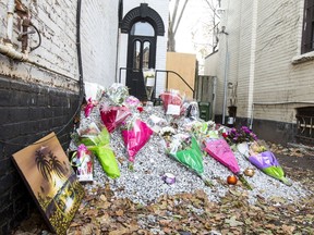 Outside of the abandoned building where the body of homicide victim Tess Richey was found, her memory is honoured by cards, candles, flowers and memorabilia near the corner of Church St. and Wellesley St. E. in Toronto, Ont.  on Dec. 3, 2017. Ernest Doroszuk/Toronto Sun/Postmedia Network