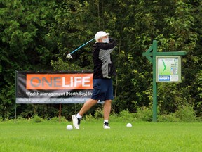 Former Ontario premier Mike Harris watches his shot to kick off the 22nd annual Osprey Links Charity Golf Gala, Wednesday, at Osprey Links.
PJ Wilson/The Nugget