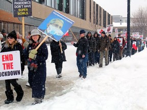Protesters march in front of the North Bay Parry Sound District Health Unit office in North Bay Monday, frustrated and angry that the area is in lockdown.
PJ Wilson/The Nugget
