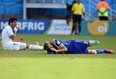 Luis Suarez checks his teeth after taking a chomp out of Giorgio Chiellini’s shoulder during Uruguay’s 1-0 win over Italy on Tuesday. It’s the third time the forward has bitten an opponent during a game.