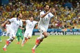 Greece's forward Georgios Samaras (C) celebrates scoring a penalty during a Group C football match between Greece and Ivory Coast at the Castelao Stadium in Fortaleza during the 2014 FIFA World Cup on June 24, 2014. AFP PHOTO / ARIS MESSINISARIS MESSINIS/AFP/Getty Images