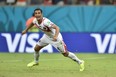 Costa Rica's defender Michael Umana celebrates after wining a Round of 16 football match between Costa Rica and Greece at Pernambuco Arena in Recife during the 2014 FIFA World Cup on June 29, 2014.  AFP PHOTO / ARIS MESSINISARIS MESSINIS/AFP/Getty Images