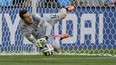 Brazil's goalkeeper Julio Cesar makes a save during a penalty shootout following regulation time during the World Cup round of 16 soccer match between Brazil and Chile at the Mineirao Stadium in Belo Horizonte, Brazil, Saturday, June 28, 2014. Brazil won 3-2 on penalties after a 1-1 tie. (AP Photo/Ricardo Mazalan)