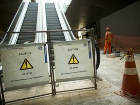 Workers put tiles on the floor of the Tancredo Neves International Airport ahead of the 2014 World Cup in Belo Horizonte, Brazil this week. Travel, because of the distance between Brazil's stadiums and unfinished work on some airports, will be one of the great challenges of this World Cup. Victor R. Caivano / The Associated Press