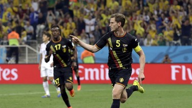 Belgium's Jan Vertonghen celebrates after scoring his side's first goal during the group H World Cup soccer match between South Korea and Belgium at the Itaquerao Stadium in Sao Paulo, Brazil, Thursday, June 26, 2014.(AP Photo/Thanassis Stavrakis)