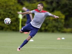 Clint Dempsey works out during a training session in Sao Paulo, Brazil June 28, 2014. The U.S. will play against Belgium on July 1, in the round 16 of the 2014 soccer World Cup. (Julio Cortez/AP)