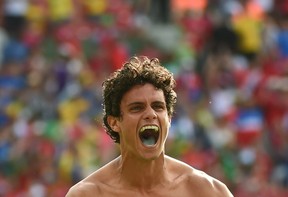 Costa Rica's midfielder Yeltsin Tejeda celebrates after a Group D football win over Italy. (EMMANUEL DUNAND/AFP/Getty Images)
