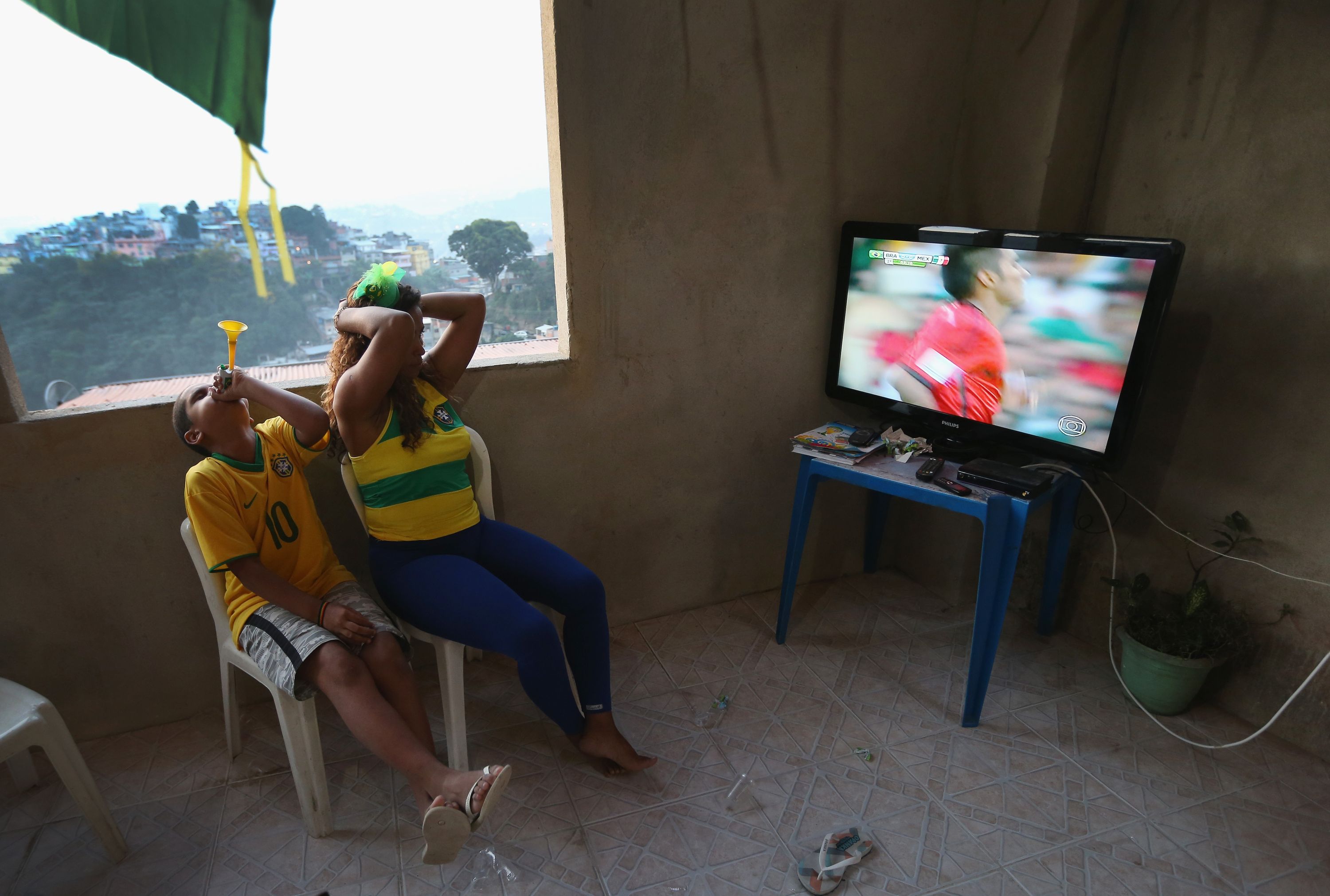 George Johnson: Favela residents resist money to relocate