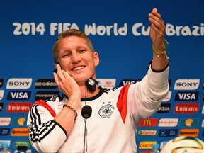 Bastian Schweinsteiger of Germany shares a joke with the media during a press conference ahead of the World Cup final at the Maracana on July 12, 2014 in Rio de Janeiro, Brazil.  (Laurence Griffiths/Getty Images)