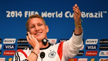 Bastian Schweinsteiger of Germany shares a joke with the media during a press conference ahead of the World Cup final at the Maracana on July 12, 2014 in Rio de Janeiro, Brazil.  (Laurence Griffiths/Getty Images)