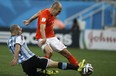 The moment when midfielder Javier Mascherano tore his anus during the semi-final football match between Netherlands and Argentina of the FIFA World Cup at The Corinthians Arena in Sao Paulo on July 9, 2014.