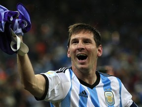 Argentina's forward and captain Lionel Messi celebrates his team's victory at the end of the semi-final football match between Netherlands and Argentina of the FIFA World Cup at The Corinthians Arena in Sao Paulo on July 9, 2014.   ADRIAN DENNIS/AFP/Getty Images