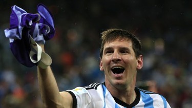 Argentina's forward and captain Lionel Messi celebrates his team's victory at the end of the semi-final football match between Netherlands and Argentina of the FIFA World Cup at The Corinthians Arena in Sao Paulo on July 9, 2014.   ADRIAN DENNIS/AFP/Getty Images