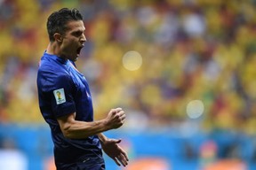 Netherlands' forward and captain Robin van Persie celebrates after scoring a goal during the third place play-off football match between Brazil and Netherlands during the 2014 FIFA World Cup at the National Stadium in Brasilia on July 12, 2014. (ANDERLEI ALMEIDA/AFP/Getty Images)