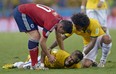 Brazil's Neymar screams in pain after being fouled during the World Cup quarter-final match against Colombia at the Arena Castelao in Fortaleza, Brazil, Friday, July 4, 2014. Neymar will miss the rest of the World Cup after breaking a vertebrae during Brazil's win over Colombia.