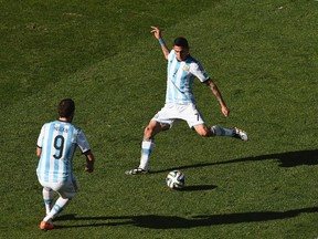 SAO PAULO, BRAZIL - JULY 01: Angel di Maria of Argentina scores his team's first goal in extra time during the 2014 FIFA World Cup Brazil Round of 16 match between Argentina and Switzerland at Arena de Sao Paulo on July 1, 2014 in Sao Paulo, Brazil.  (Photo by Matthias Hangst/Getty Images)