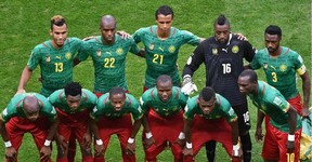 Cameroon's national team (back L-R) Cameroon's forward Eric Maxim Choupo-Moting, Cameroon's defender Allan Nyom, Cameroon's midfielder Joel Matip, Cameroon's goalkeeper Charles Itandje and Cameroon's defender Nicolas Nkoulou  (front L-R) Cameroon's midfielder Stephane Mbia, Cameroon's midfielder Alexandre Song, Cameroon's midfielder Jean Makoun, Cameroon's midfielder Landry N'Guemo, Cameroon's defender Henri Bedimo and Cameroon's forward Vincent Aboubakar pose for a team photo prior to the Group A football match between Cameroon and Brazil at the Mane Garrincha National Stadium in Brasilia during the 2014 FIFA World Cup on June 23, 2014.  AFP PHOTO / EVARISTO SAEVARISTO SA/AFP/Getty Images