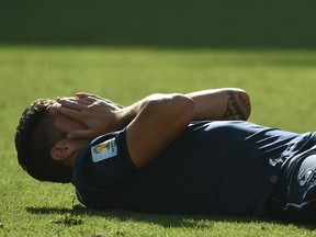 France's forward Olivier Giroud down onthe ground. (YASUYOSHI CHIBA/AFP/Getty Images)