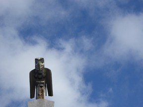 The eagle stands watch over the longhouse in Alert Bay, BC, where more people are coming to explore Indigenous tourism experiences. Photo credit Jennifer Allford.