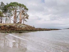 The beaches of Savary Island seen from Manzanita Bluff along the Sunshine Coast Trail.