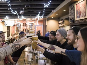 people cheers at the Jasper Brewing Company