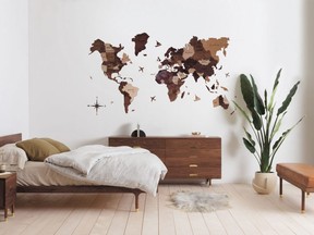A 3D wooden map can be wall mounted to track travel trips — or just be used as an interesting art piece.