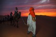 Going camel trekking (when it's cool out) and overnighting in the desert  is an essential Moroccan experience. [G Adventures]