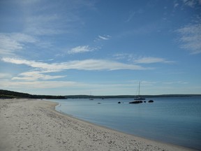 The water on Nova Scotia's beaches may not be as warm as the Caribbean, but it sure is pretty [Photo by rowanajo/Pixabay]