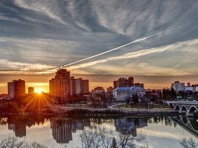 The sun sets over Saskatoon's city skyline. [Photo credit: Image by James Nagarbaul via Pixabay CC BY 0]