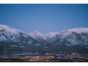 An aerial view of the town of Canmore at night