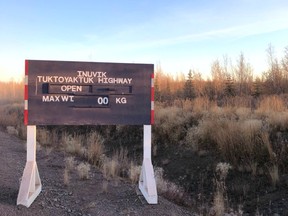 Sign for the Inuvik Tuktoyaktuk highway
