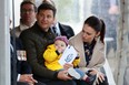 Prime Minister Jacinda Ardern,her partner Clarke Gayford, with their child Neve