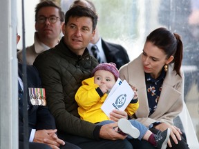 Prime Minister Jacinda Ardern,her partner Clarke Gayford, with their child Neve