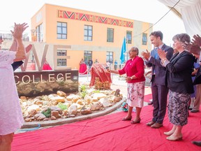 Kenya’s first lady Margaret Kenyatta, second from right, cuts a ribbon at the country’s new WE College alongside the charity’s co-founder Craig Kielburger.