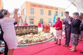 Kenya’s first lady Margaret Kenyatta, second from right, cuts a ribbon at the country’s new WE College alongside the charity’s co-founder Craig Kielburger.