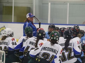 Lisa Haley coaches the female hockey players on Hit the Ice. APTN