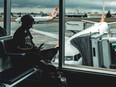 Smartphone traveller at the airport