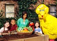 Michelle Obama with the Sesame Street cast.