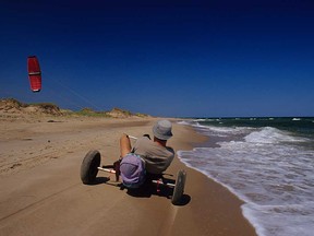 Let the wind carry you on a kitebuggy along the shores of les Îles de la Madeleine in Quebec.