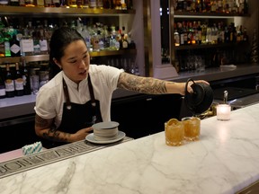 Pouring a "Rye Chai" at the H Tasting Bar at the Westin Bayshore Hotel in Vancouver.